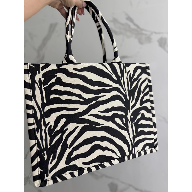 Zebra pakolós táska