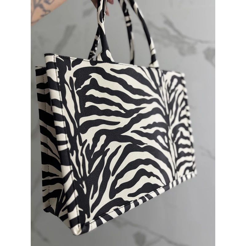 Zebra pakolós táska